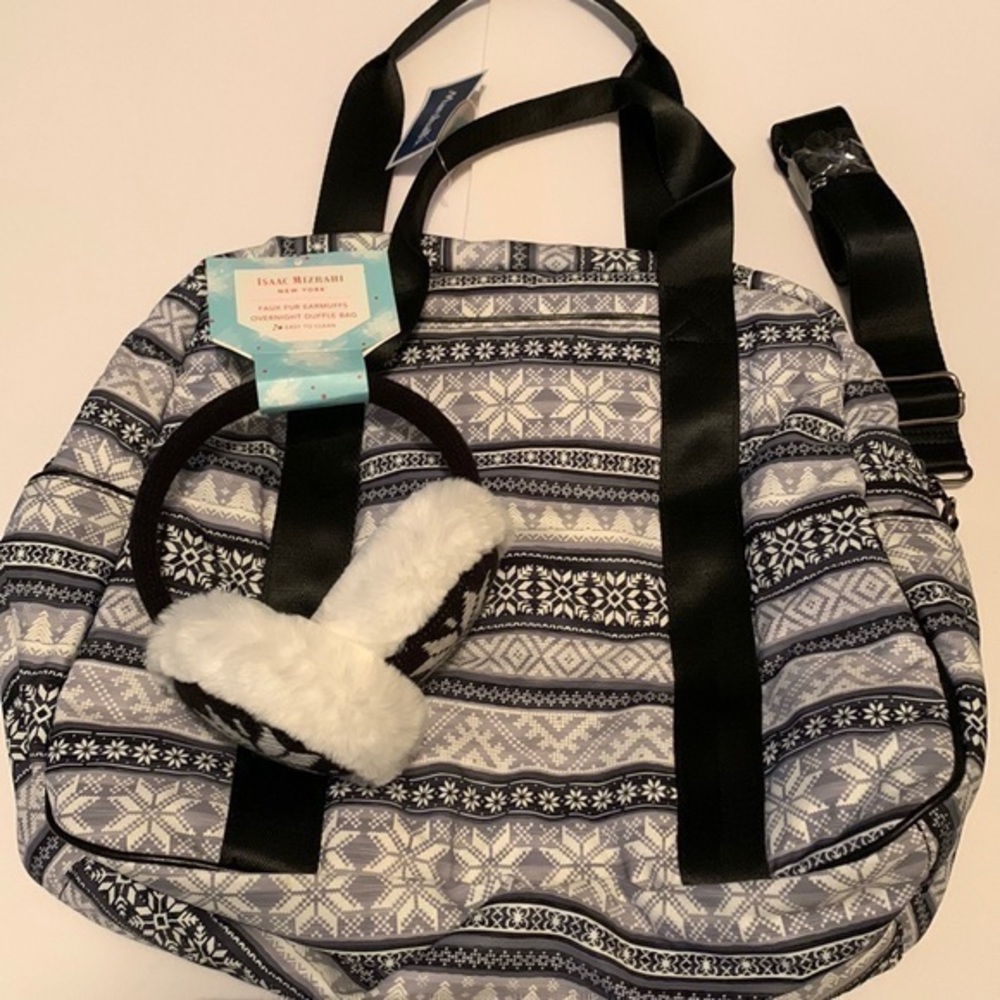 Isaac Mizrahi overnight duffle bag with ear muffs.